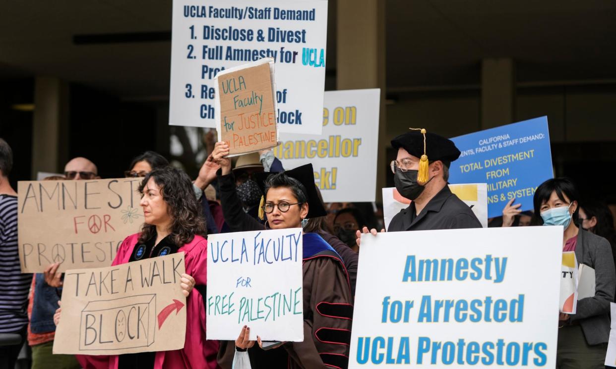 <span>UCLA faculty and staff members in Los Angeles on 9 May.</span><span>Photograph: Jae C Hong/AP</span>