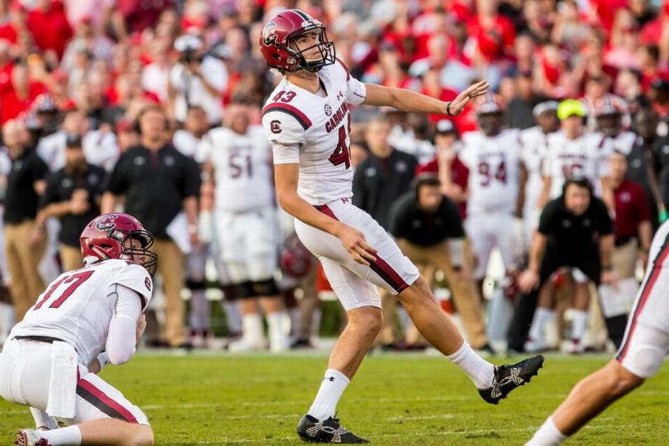 South Carolina Gamecocks place kicker Parker White (43) successfully kicks a field goal in the second half of the game between the South Carolina Gamecocks and the Georgia Bulldogs at Sanford Stadium in Athens, Ga.