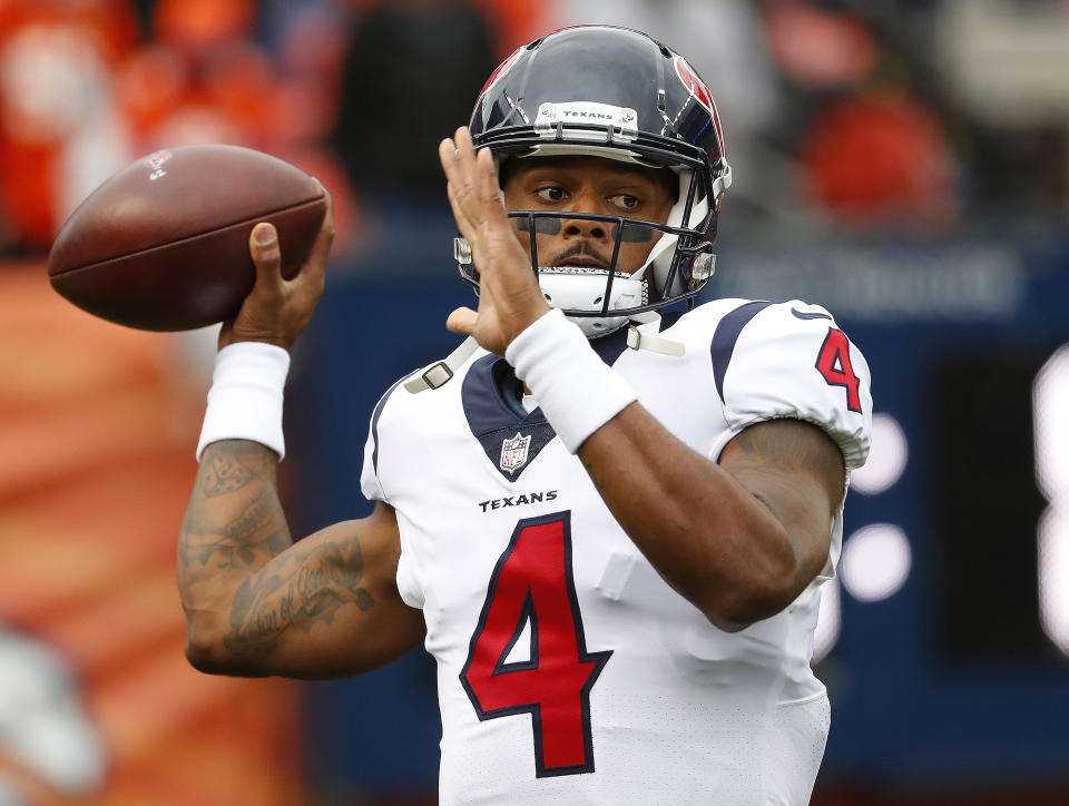 Houston Texans quarterback Deshaun Watson (4) warms up prior to an NFL football game against the Denver Broncos, Sunday, Nov. 4, 2018, in Denver. (AP Photo/Jack Dempsey)