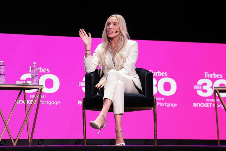 <span class="caption">Alexandra Cooper, one half of the duo behind the popular advice podcast ‘Call Her Daddy,’ signed an exclusive deal with Spotify in 2021.</span> <span class="attribution"><a class="link " href="https://www.gettyimages.com/detail/news-photo/alexandra-cooper-speaks-during-the-2021-forbes-30-under-30-news-photo/1346278208?adppopup=true" rel="nofollow noopener" target="_blank" data-ylk="slk:Taylor Hill/Getty Images;elm:context_link;itc:0;sec:content-canvas">Taylor Hill/Getty Images</a></span>