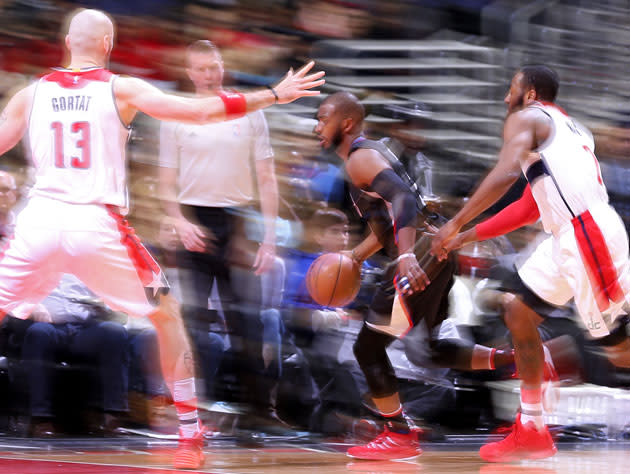 Chris Paul moves slower than the human eye can comprehend. (Getty Images)