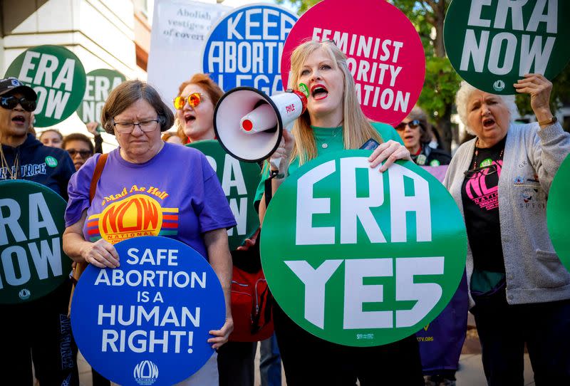 FILE PHOTO: Demonstrators call for passage of the Equal Rights Amendment outside the district courthouse in Washington