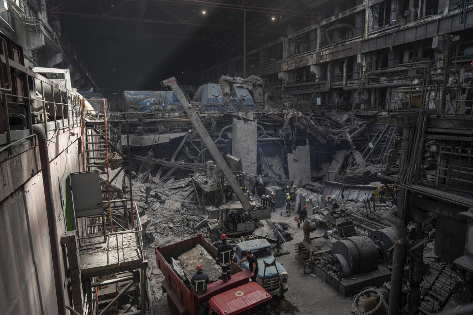 Rescue workers clear the rubble at DTEK's power plant which was destroyed by a Russian missile attack in Ukraine, on Monday, April 1, 2024. Russia is attacking Ukraine’s energy sector with renewed intensity and alarming accuracy, signaling to Ukrainian officials that Russia is armed with better intelligence and fresh tactics in its campaign to annihilate the country’s power generation capacity. (AP Photo/Evgeniy Maloletka)