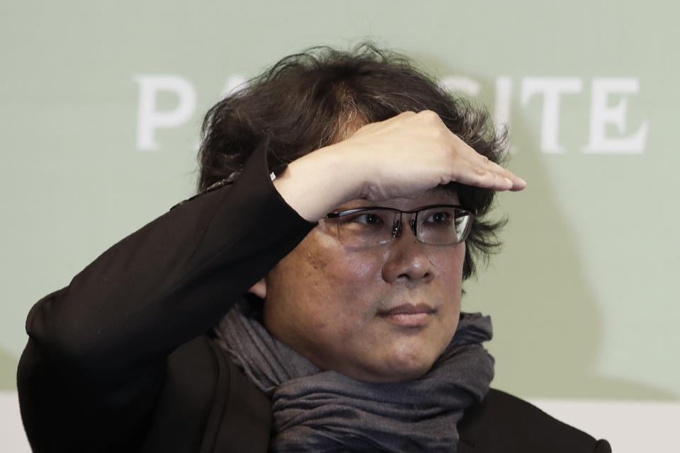 Bong Joon-ho, director of Oscar-winning “Parasite,” listens to a question during a press conference in Seoul, South Korea, Wednesday, Feb. 19, 2020. Bong said Wednesday “the biggest pleasure and the most significant meaning” that the film has brought to him was its success in many countries though the audiences might feel uncomfortable with his explicit description of a bitter wealth disparity in modern society. (AP Photo/Ahn Young-joon)