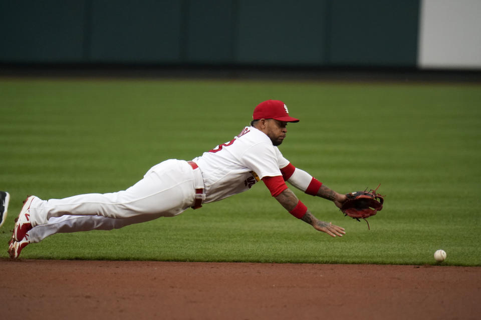 St. Louis Cardinals shortstop Edmundo Sosa is unable to reach a single by Pittsburgh Pirates' Gregory Polanco during the second inning of a baseball game Tuesday, May 18, 2021, in St. Louis. (AP Photo/Jeff Roberson)