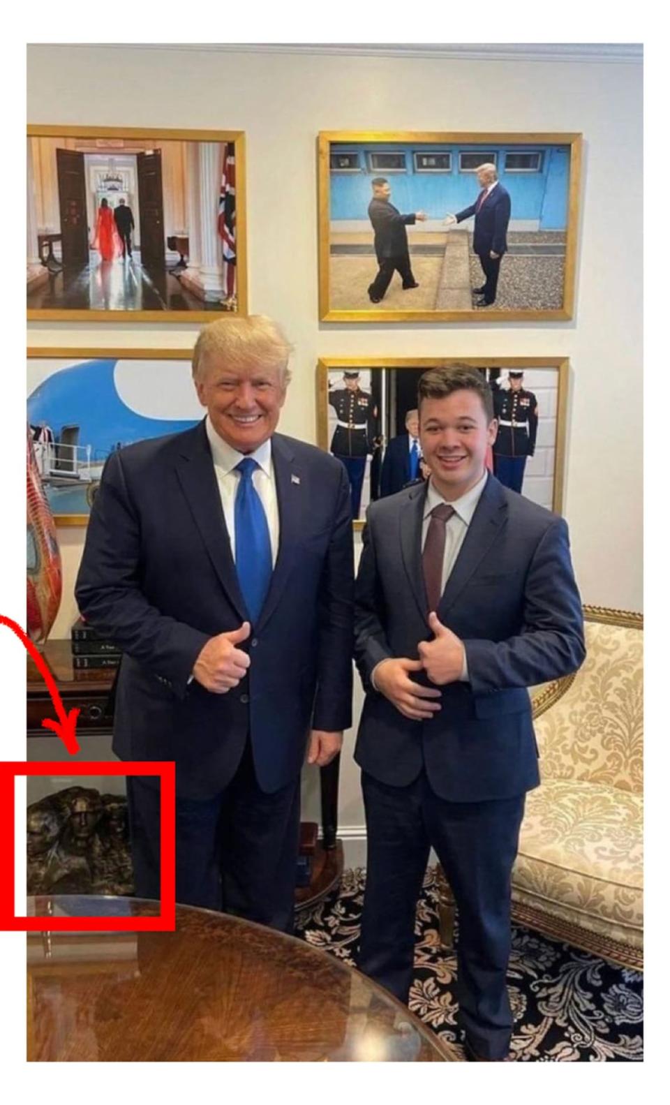 <div class="inline-image__caption"><p>The Mount Trumpmore sculpture peeks out from under a table in this photo of Donald Trump and Kyle Rittenhouse.</p></div> <div class="inline-image__credit">Photo Illustration by The Daily Beast/Twitter/Big League Politics</div>