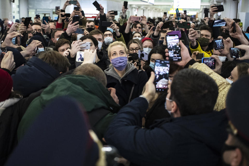 FILE - In this Sunday, Jan. 17, 2021 file photo, Russian opposition leader Alexei Navalny's wife Yulia is photographed as she walks after arrival at Sheremetyevo airport in Moscow, Russia. Moscow is bracing for more protests seeking the release of jailed opposition leader Alexei Navalny, who faces a court hearing Tuesday. Navalny was jailed last month and faces years in prison. Tens of thousands filled the streets across the vast country Sunday for a second straight weekend calling for his freedom, with thousands of arrests in the largest outpouring of discontent in Russia in years. (AP Photo/Pavel Golovkin, File)