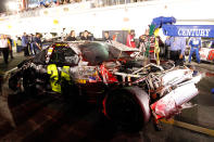 DAYTONA BEACH, FL - FEBRUARY 18: Jeff Gordon, driver of the #24 Drive to End Hunger Chevrolet, is towed in the garage after flipping during an on track incident during the NASCAR Budweiser Shootout at Daytona International Speedway on February 18, 2012 in Daytona Beach, Florida. (Photo by Chris Graythen/Getty Images)