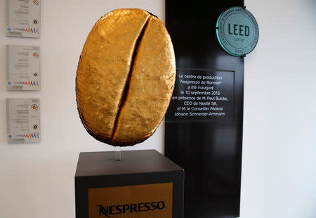 FILE PHOTO: A giant coffee bean is pictured at the Nespresso plant, part of food giant Nestle, in Romont, Switzerland, November 19, 2018. REUTERS/Denis Balibouse/File Photo