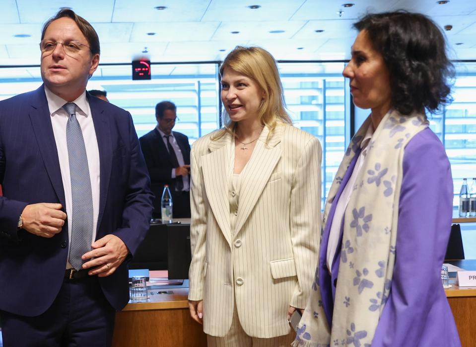 European Union enlargment chief Oliver Varhelyi (L) is pictured with Ukrainian European affairs minister Olha Stefanishyna (C) and Belgian foreign minister Hadja Lahbib (R) in Luxembourg (EPA)