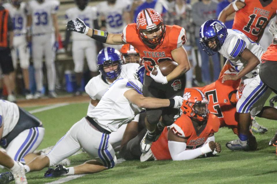 Mansfield Senior's Ricky Mills had a career night on defense and helped the Tygers pick up a 16-0 win over Defiance on Friday night at Arlin Field.