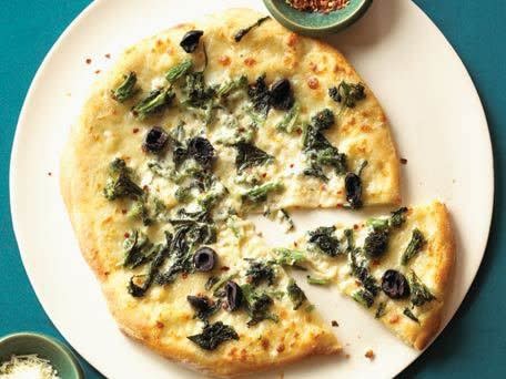 <strong>Get <a href="http://www.huffingtonpost.com/2011/10/27/delfinas-broccoli-rabe-p_n_1059928.html">Delfina's Broccoli Rabe Pizza</a> recipe</strong>