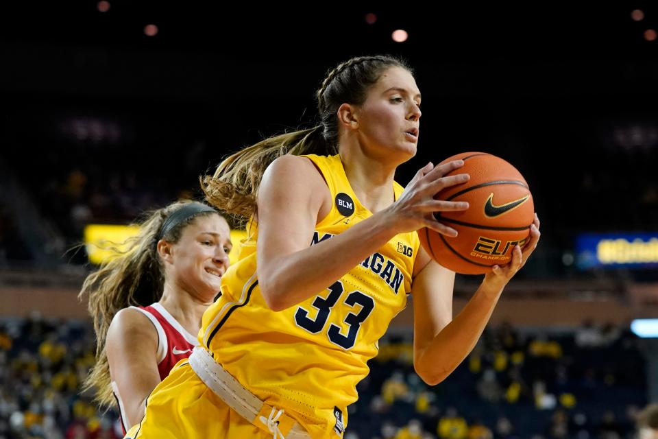 Michigan forward Emily Kiser grabs a rebound during the first half against Ohio State on Friday, Dec. 31, 2021, at Crisler Center.