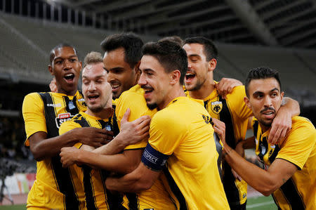 Soccer Football - Champions League - Third Qualifying Round Second Leg - AEK Athens v Celtic - Athens Olympic Stadium, Athens, Greece - August 14, 2018 AEK Athens' Rodrigo Galo celebrates scoring their first goal with team mates REUTERS/Alkis Konstantinidis