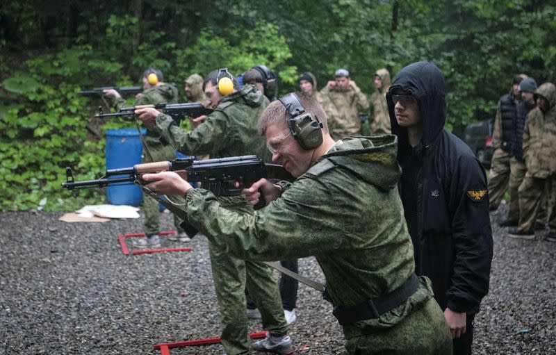 Pupils fire weapons and practise first aid at a range, in Vladikavkaz