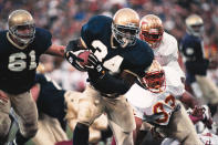 FILE - In this Nov. 13, 1993, file photo, Notre Dame back Ray Zellars (34) heads upfield during an NCAA college football game against Florida State in South Bend, Ind. The Irish won the game 31-24 and went on to lose the following week to Boston College, losing out on a national title. (AP Photo/Joe Raymond, File)