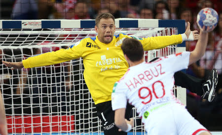 Handball - Men's EHF European Handball Championship - main round Group I - Croatia v Belarus - Arena Zagreb, Zagreb, Croatia - January 18, 2018. Hleb Harbuz of Belarus in action with goalkeeper Ivan Stevanovic of Croatia. REUTERS/Marko Djurica