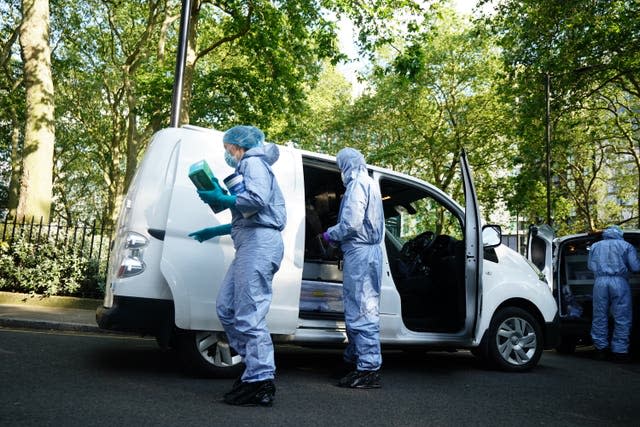 Police forensics officers at the scene in Paddington Green 