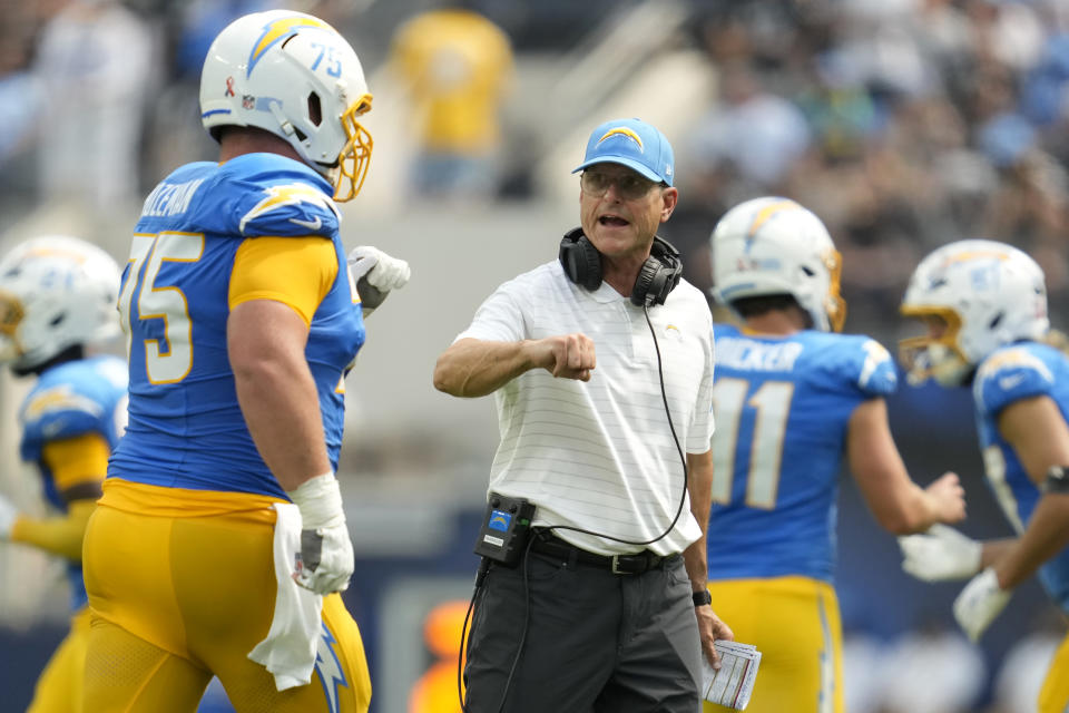 It's only Jim Harbaugh's first game as head coach of the Chargers, but Sunday's win had some familiar features. (AP Photo/Ashley Landis)