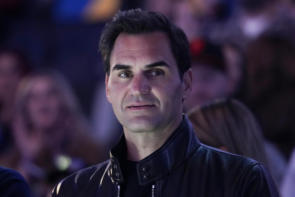 Roger Federer watches as the Golden State Warriors are introduced before an NBA basketball game against the San Antonio Spurs, Saturday, March 9, 2024, in San Francisco. (AP Photo/Godofredo A. Vásquez)