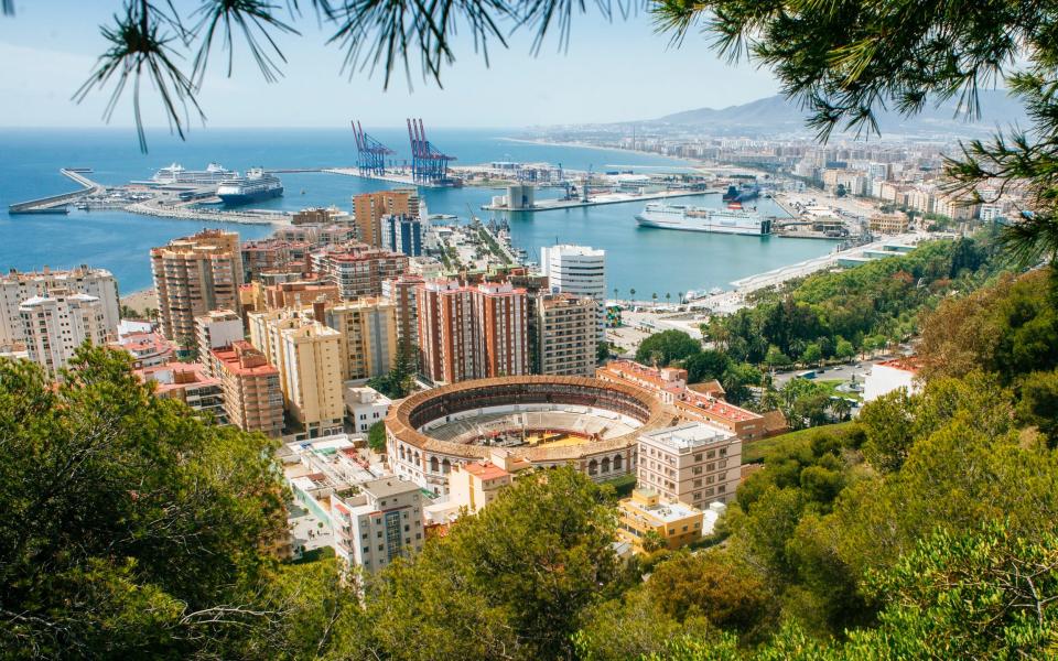 Malaga landscape with the bullring and the port