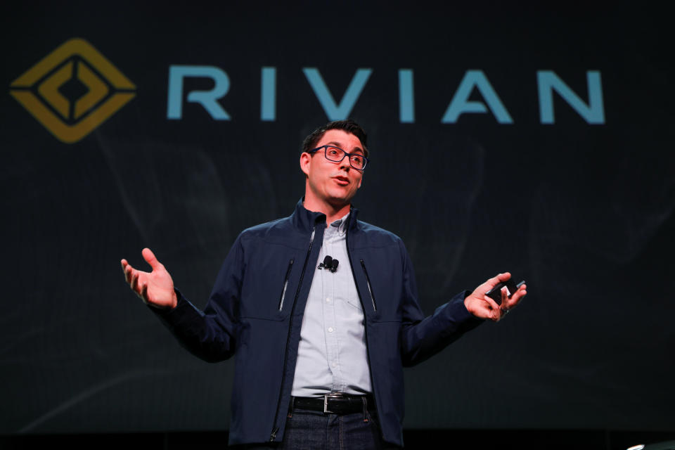 R.J. Scaringe, Rivian's 35-year-old CEO, introduces his company's R1T all-electric pickup and all-electric R1S SUV at Los Angeles Auto Show in Los Angeles, California, U.S. November 27, 2018.  REUTERS/Mike Blake