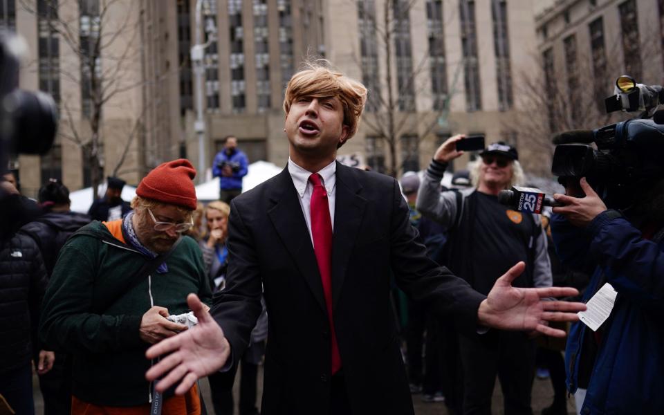 A Trump impersonator outside New York Criminal Court - WILL OLIVER/EPA-EFE/Shutterstock