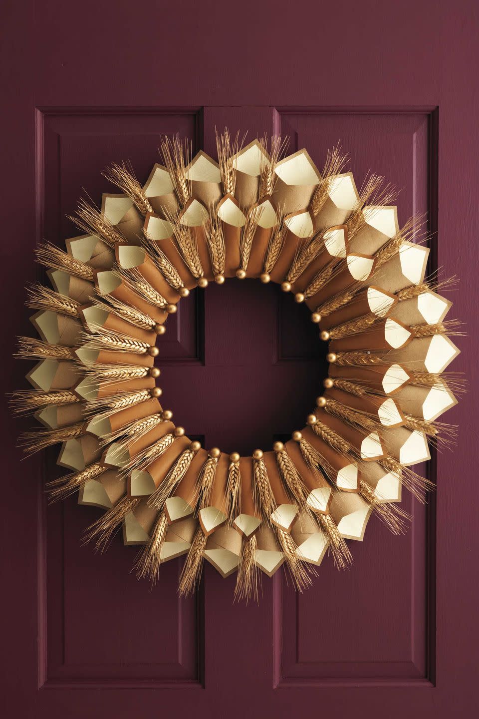 <p>Yes, this wreath is elegant and welcoming, but it's also a great conversation starter: Prior to your Thanksgiving dinner, ask guests to write down something they're grateful for on a piece of paper, which they can then tuck into this decoration's pockets.</p><p><strong>Get the tutorial at <a href="https://www.womansday.com/home/crafts-projects/how-to/a5356/thanksgiving-craft-paper-cone-gratitude-wreath-112583/" rel="nofollow noopener" target="_blank" data-ylk="slk:Woman's Day;elm:context_link;itc:0;sec:content-canvas" class="link ">Woman's Day</a>.</strong></p><p><a class="link " href="https://www.amazon.com/Sumind-Wreath-Making-Valentines-Decoration/dp/B075NXND36/ref=sr_1_1?dchild=1&keywords=floral+wreath+wire&qid=1630082548&sr=8-1&tag=syn-yahoo-20&ascsubtag=%5Bartid%7C10050.g.22628923%5Bsrc%7Cyahoo-us" rel="nofollow noopener" target="_blank" data-ylk="slk:SHOP WIRE WREATH BASES;elm:context_link;itc:0;sec:content-canvas">SHOP WIRE WREATH BASES</a></p>