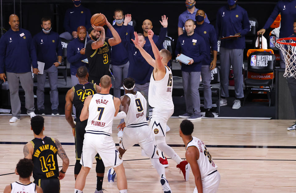 LAKE BUENA VISTA, FLORIDA - SEPTEMBER 20: Anthony Davis #3 of the Los Angeles Lakers shoots a three point basket to win the game over Denver Nuggets in Game Two of the Western Conference Finals during the 2020 NBA Playoffs at AdventHealth Arena at the ESPN Wide World Of Sports Complex on September 20, 2020 in Lake Buena Vista, Florida. NOTE TO USER: User expressly acknowledges and agrees that, by downloading and or using this photograph, User is consenting to the terms and conditions of the Getty Images License Agreement. (Photo by Kevin C. Cox/Getty Images)