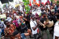 Musicians play during a demonstration by supporters of opposition leader Martin Fayulu protesting against changes to the independence of the country’s electoral commission, in Kinshasa