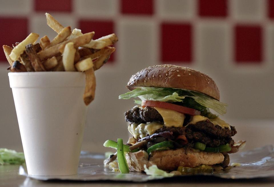Stacked high: A regular burger comes with two patties at Five Guys.