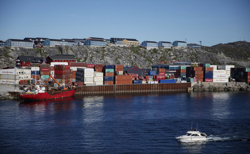 Containers are stacked at a port in Nuuk on July 29, 2017. Cargo ships sailing through the Northwest Passage could potentially cut the distance from East Asia to Western Europe by thousands of miles. (Photo: ASSOCIATED PRESS)