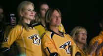 <p>Nicole Kidman and Keith Urban rock personalized Predators jerseys during Game 3 of the Stanley Cup Final in Nashville. (Terry Wyatt/Getty Images) </p>