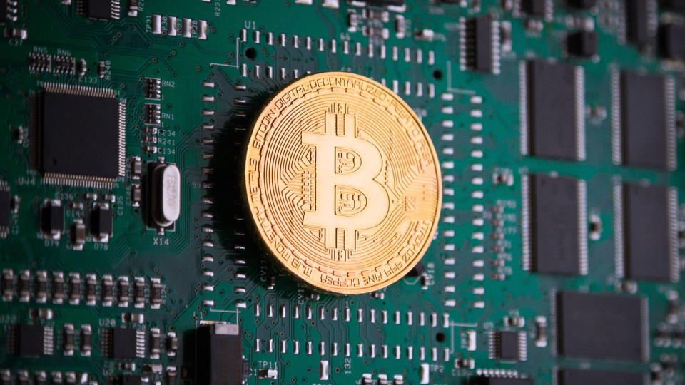 Bitcoin cryptocurrency on a circuit board