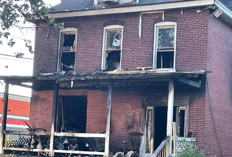 A man was killed and four others were injured, including three girls rescued in critical condition, from a house fire early Thursday on Midland Avenue just south of West Broad Street in the Hilltop.