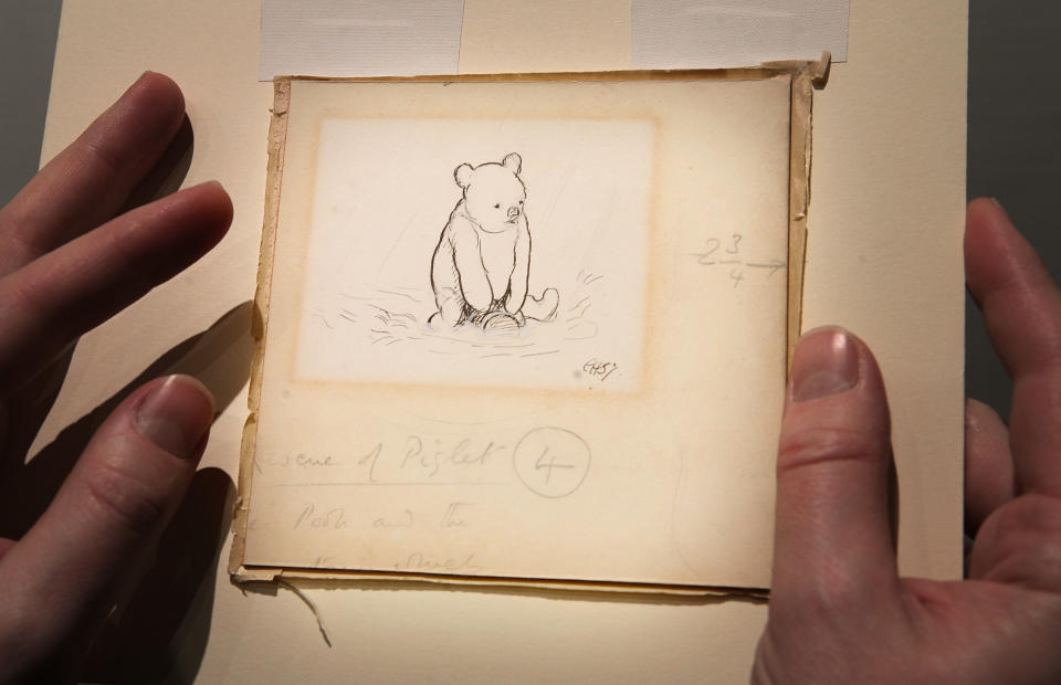 Early drawings by Pooh co-creator E.H. Shepard depict the bear with no clothes at all, as shown in this sketch from the 1920s titled “Floating Bear.” (Photo: Getty Images).