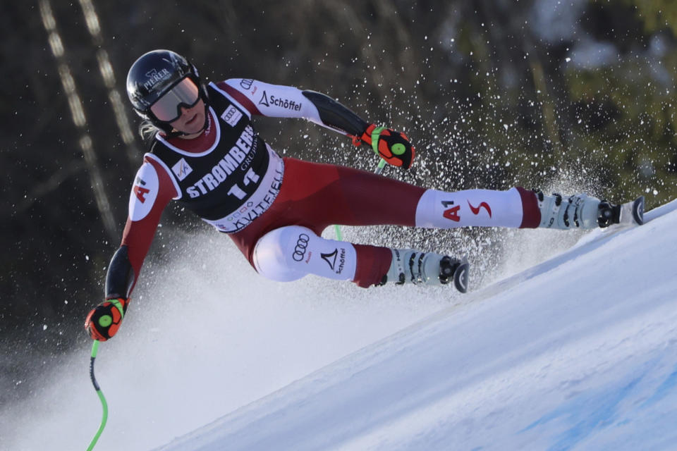 Austria's Cornelia Huetter speeds down the course during an alpine ski, women's World Cup Super G race in Kvitfjell, Norway, Friday, March 3, 2023. (AP Photo/Marco Trovati)