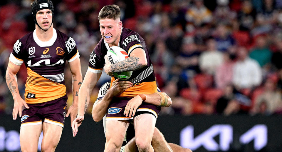 Seen here, Josh Rogers running in his NRL debut for the Broncos in the round 27 match against the Melbourne Storm.