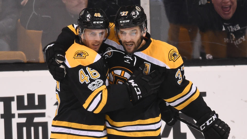 David Krejci #46 and Patrice Bergeron #37 are back with the Bruins.  (Photo by Steve Babineau/NHLI via Getty Images) 