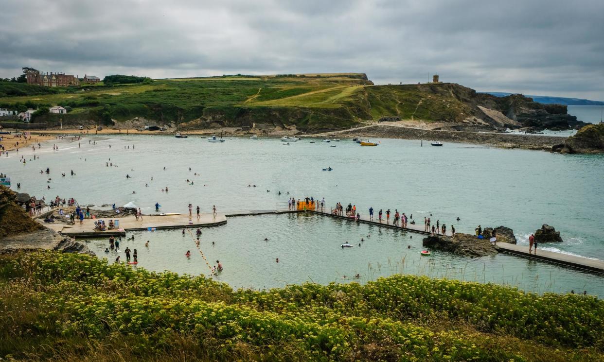 <span>Couples could choose to have the ceremony in the water, or floating on paddleboards, or on the rocks nearby.</span><span>Photograph: gollykim/Getty Images</span>