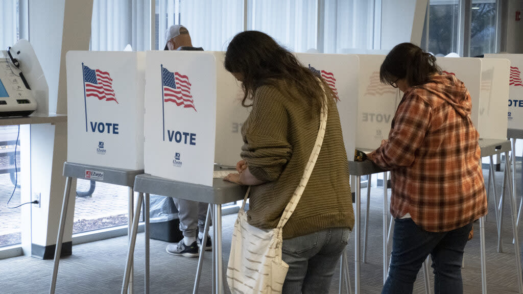 Voters fill out ballots