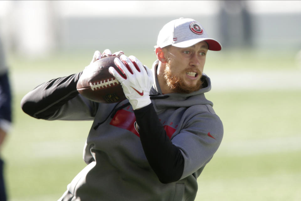 San Francisco 49ers tight end George Kittle makes a catch as he warms up before an NFL football game against the Seattle Seahawks, Sunday, Nov. 1, 2020, in Seattle. (AP Photo/Scott Eklund)