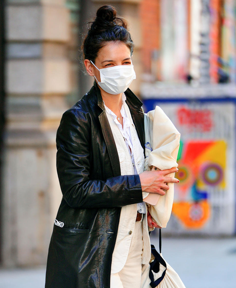 <p>Katie Holmes smiles from behind her mask on Thursday while out in New York City.</p>