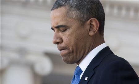 U.S. President Barack Obama speaks during Memorial Day ceremonies at Arlington National Cemetery in Virginia May 26, 2014. REUTERS/Joshua Roberts