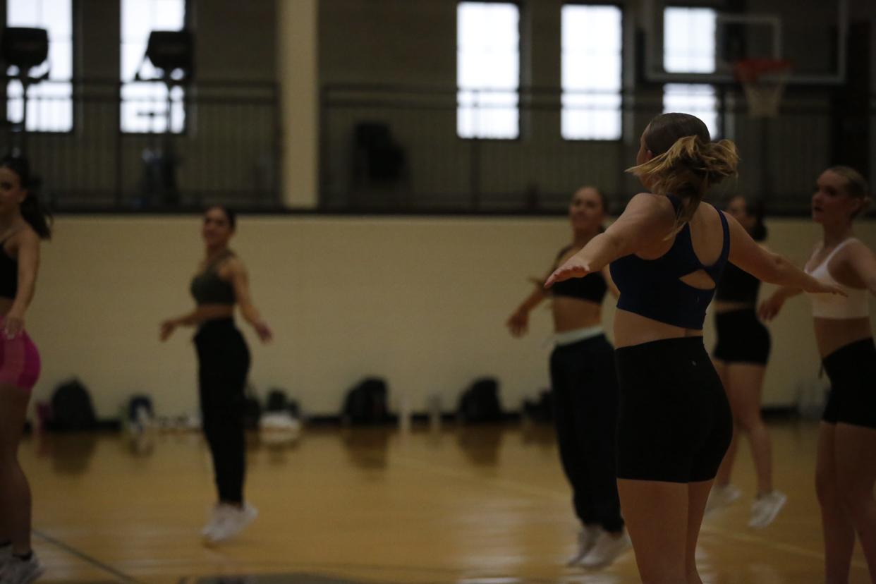 Members of the Washburn Dancing Blues meet for more than 12 hours a week to rehearse and weight train together.