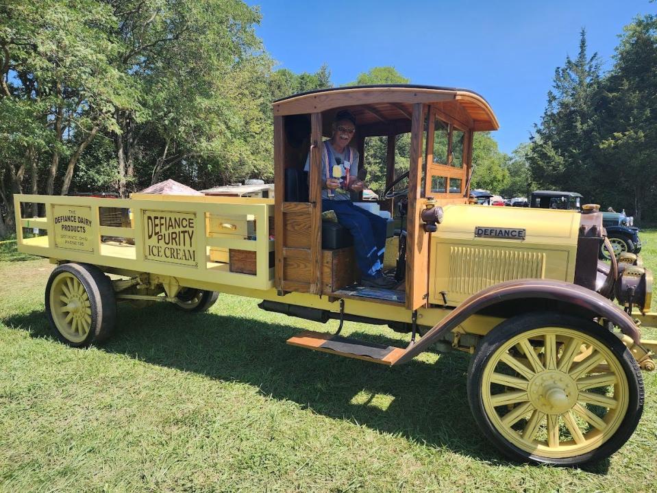 Lynn Lentz shows off his antique ice cream truck at the SCRAP festival.