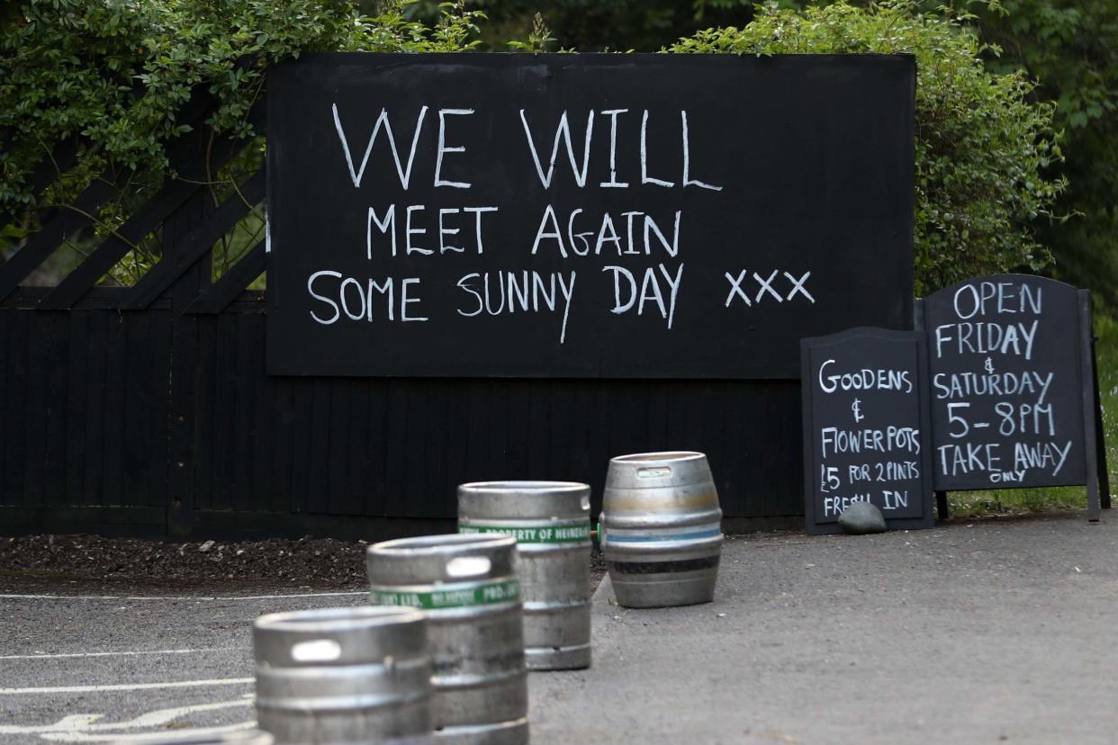 A chalk board is seen at a local pub in Burridge, which offers take-away beer for members of the public: Getty Images