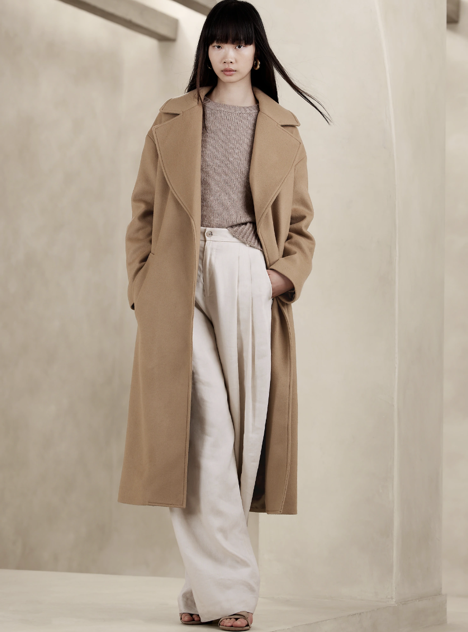 asian model wearing white pants, sweater and camel Pura Wool-Cashmere Wrap Coat (Photo via Banana Republic)