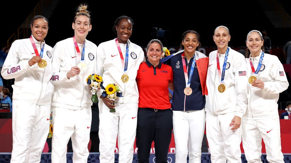 Collier and Stewart celebrate winning an Olympic gold medal in Tokyo alongside their Team USA teammates. - Gregory Shamus/Getty Images