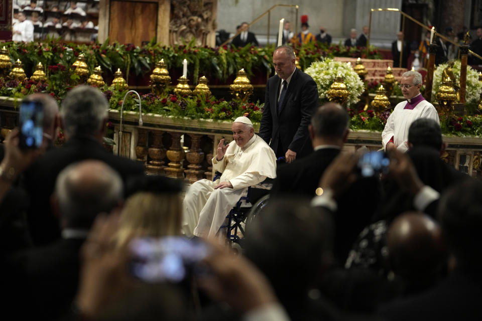 Pope Francis leaves after a Mass on the Solemnity of Saints Peter and Paul, in St. Peter's Basilica at the Vatican, Wednesday, June 29, 2022. (AP Photo/Alessandra Tarantino)